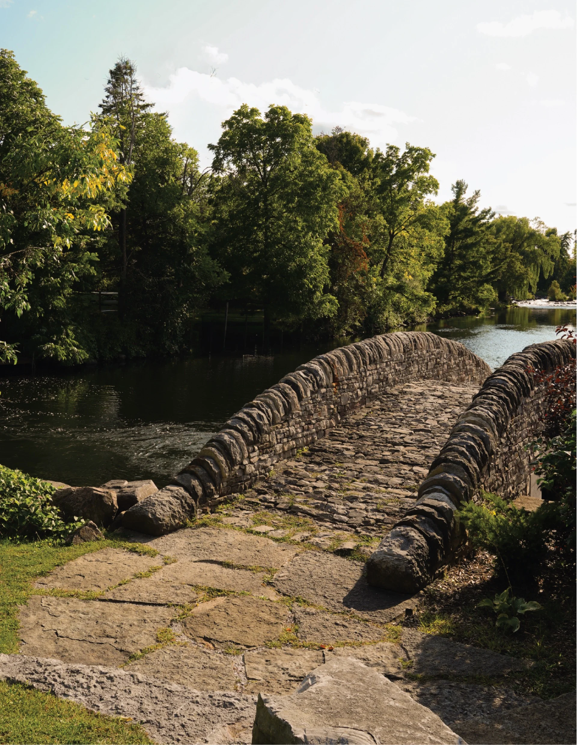 Perth stone bridge surrounded by autumn foliage